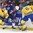 BUFFALO, NEW YORK - JANUARY 4: USA's Trent Frederic #34 battles for the puck with Sweden's Marcus Davidsson #10 and Linus Hogberg #6 during semifinal round action at the 2018 IIHF World Junior Championship. (Photo by Matt Zambonin/HHOF-IIHF Images)

